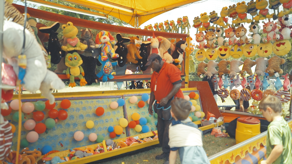 Kid playing carnival games